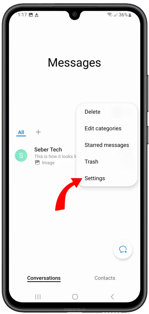 After tapping on the three dots, a drop-down menu will appear. Scroll down and select the "Settings" option from the list. This will open the settings menu specific to the Messages app.
